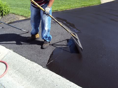 A Dayton Ohio Client Asks: Parking Lot Maintenance and Asphalt Sealing - Brushing or Spraying - Which is best?